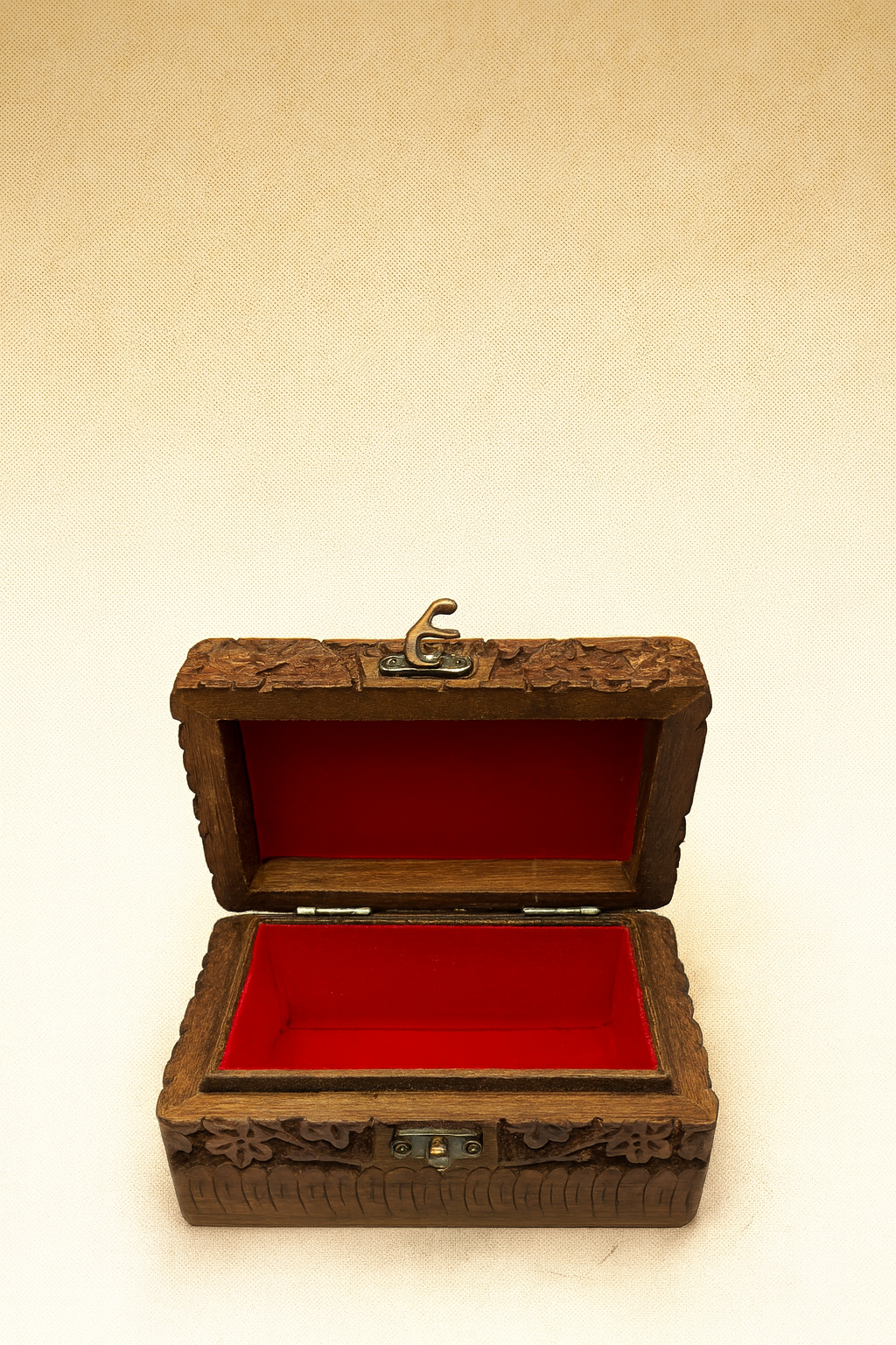 Open Hand-Carved Wooden Jewelry Box with Red Velvet Lining